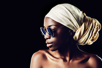 Black woman, sunglasses and scarf with fashion for style on a dark studio background. Face of young...