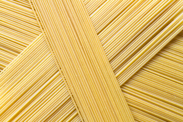 Spaghetti texture. Background texture of pasta. Raw spaghetti close-up.