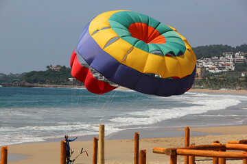 Parasailing, Parascending or Parakiting is an aquatic activity where a person attached to a...