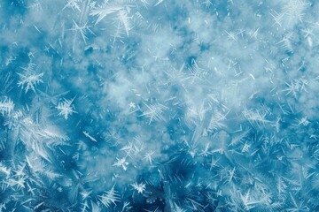 A frosted, icy texture with crystalline noise details on a cool blue background, suggesting the crispness of winter