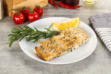Baked salmon fish served rosemary