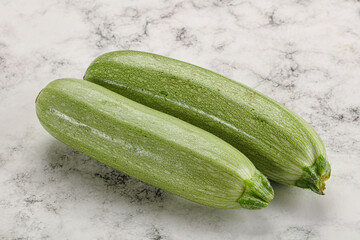 Raw green ripe zucchini vegetable