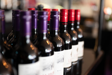 Bottles of wine in a bar.