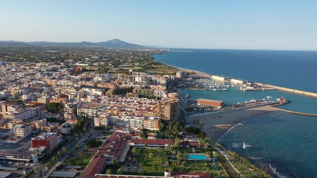 Drone photo of Benicarlo with view of port and residential buildings along sea coast. North of Province of Castello, Spain.