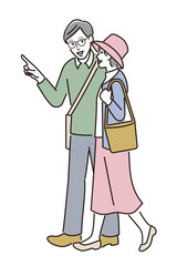 歩いている高齢の夫婦