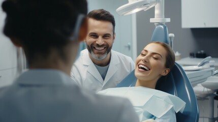 A smiling woman patient in a dental chair is being examined by a dentist, an orthodontist in a dental clinic. Teeth whitening, Brushing, Braces, Veneers, Health Care, Oral Hygiene.