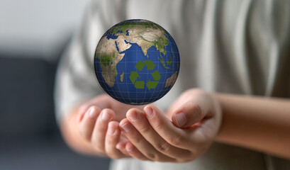 Hand holding saving clean energy earth globe world environment green eco friendly, save planet, csr social responsibility.campaign save the earth and earth Day 22 April