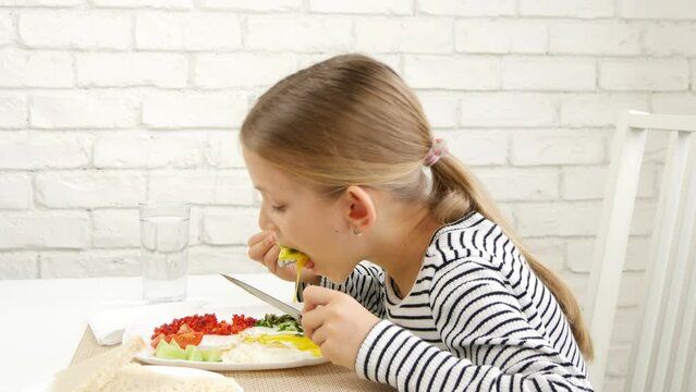 Child Eating Breakfast in Kitchen, Kid Eats Fried Eggs, Teenager Girl Enjoying Vegetables, Greenery Healthy Food
