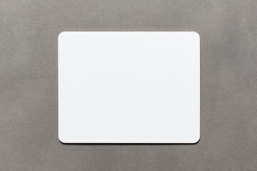White square coaster mockup on grey textured background.