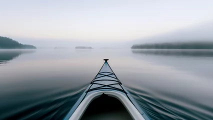Foto op Canvas Kayak on serene lake in still water during misty morning. Kayaker moves through dreamlike landscape demonstrating quiet luxury. Serene beauty © lenblr