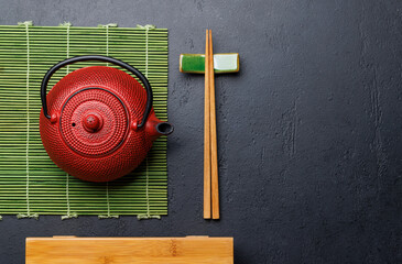Japanese Table Setting with Wooden Board, Teapot, Chopsticks - 755404170