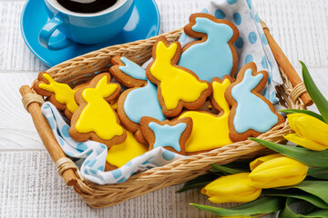 Easter Bunny-Shaped Gingerbread Cookies, Yellow Tulips, and Coffee Cup - 755404929