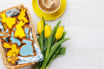 Easter Bunny-Shaped Gingerbread Cookies, Yellow Tulips, and Coffee Cup