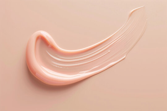Pink cosmetic smear on a peach fuzz background. Skincare and beauty procedures.