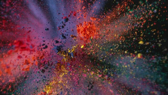 Super slowmotion shot of color powder explosion isolated 