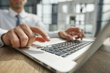 close-up. business man works on a laptop.