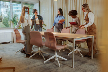 Businesswomen about to have a meeting inside of the glass office - 755418597