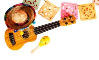 Traditional paper flag, maracas, guitar and large sombrero for Cinco de Mayo holiday party.
