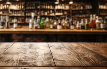 Fotobehang Empty wooden table for product demonstration and presentation on the background of a bar, store, with alcoholic drinks © syhin_stas