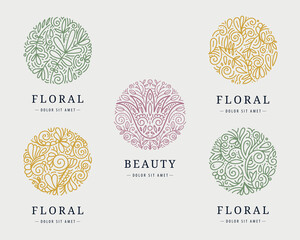Vector set of floral monogram swirl logos. Vintage flower emblems, wedding design, eco, spa circle patterns, flourish plant badge