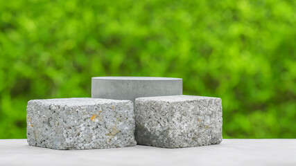 Podium with green forest blur background