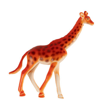 Plastic giraffe toy, isolated on white background.