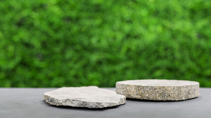 Podium with green forest blur background