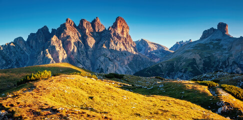 Great rocky massif in the Italian Alps on a sunny day. National Park Tre Cime di Lavaredo,...