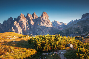 Great rocky massif in the Italian Alps on a sunny day. National Park Tre Cime di Lavaredo,...
