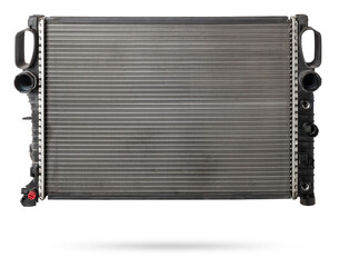Car cooling radiator isolated on white background. Spare cooling system of internal combustion...