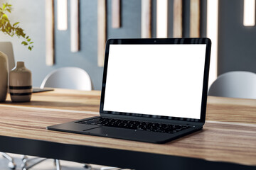 Modern laptop with isolated screen on a wooden table, contemporary conference room setting. 3D...