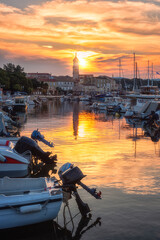Scenic view of Krk, the town on the Krk island, Kvarner bay, Croatia. Beautiful cityscape with medieval architecture, harbor with yachts and rising sun, Adriatic seacoast, outdoor travel background - 755451712