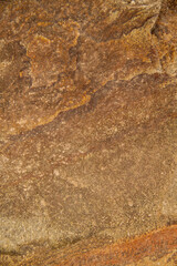 Texture of natural brown stone. Geodesy rocky texture