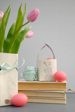 Blooming tulips, books and homemade Easter decorations