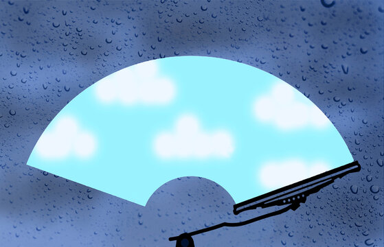 Windshield wiper revealing sunny sky