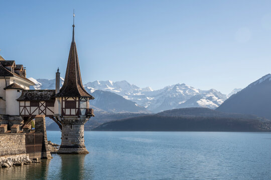 Switzerland, Bern Canton, Thun, Lake Thun with Oberhoffen Castle in foreground