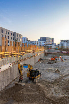 Construction site of new buildings with backhoes