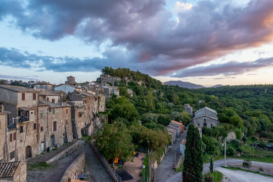 Scenic view of buildings under cloudy sky