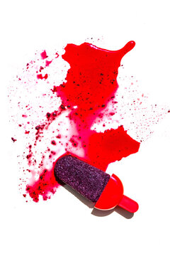 Berry popsicle staining white background