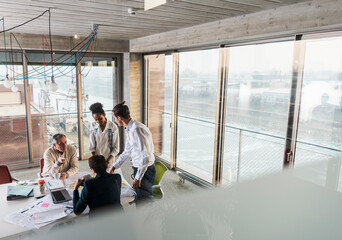 Colleagues doing business meeting in office