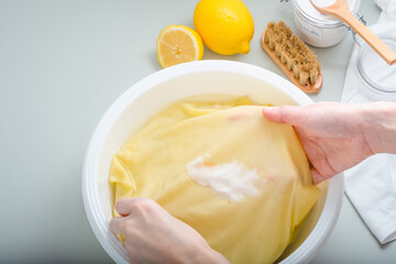 Homemade eco-friendly removing of stains on clothes with baking soda. Natural cleaning products....