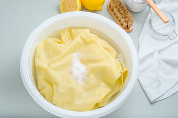 Homemade eco-friendly removing of stains on clothes with baking soda. Natural cleaning products....