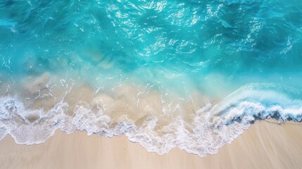 The ocean is calm and the water is blue. The sand is white and the waves are gentle - obrazy, fototapety, plakaty