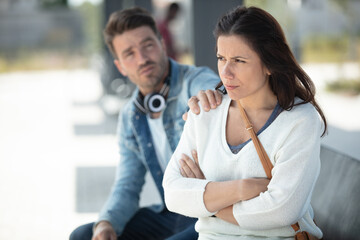 young couple upset because they lost the train