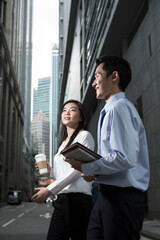 Happy Asian Business people talking to each other.