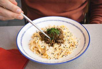 Asian udon noodles with beef, miso and parmesan