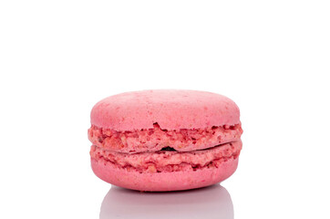 One sweet macaron, macro, isolated on white background.