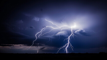 A striking flash of lightning illuminates the dark background