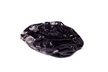 Dried plum fruit on a white background.