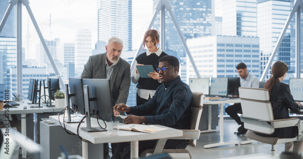 Poster diverse colleagues talking in front of desktop computer in corporate office with megapolis window vi